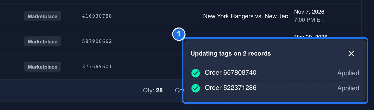 The Updating tags on 2 records progress box in the bottom-right corner, with both orders showing Applied, marked 1